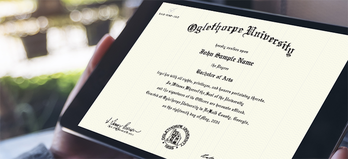 a sample Oglethorpe University diploma is viewed on a tablet